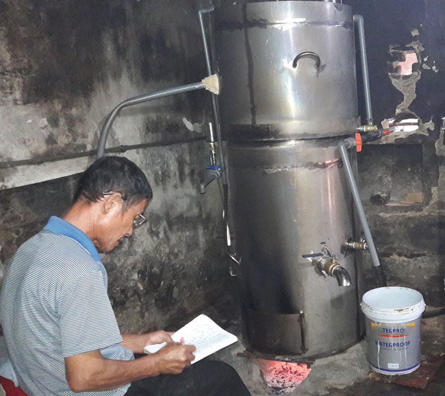 Lò nấu rượu bằng củi cải tiến